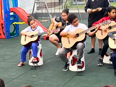 Vagas abertas para aulas grátis de violão, percussão e judô na Gota de Leite