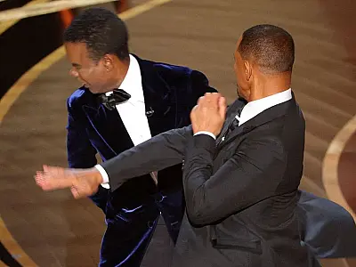 Entre tapas e beijos: Will Smith pede desculpas a Chris Rock
