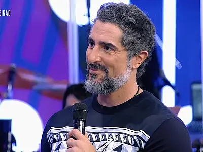Mion se inspira em Gugu de novo e fará game nas casas de anônimos na Globo
