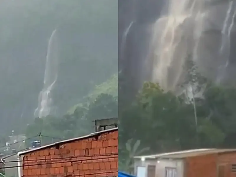 Chuva cai forte sobre a Baixada e forma até cachoeira em morro de Guarujá; veja o vídeo