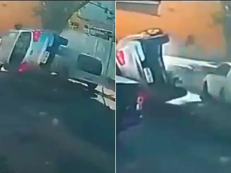 Carro capota após bater em veículo estacionado no Bairro do Embaré, em Santos