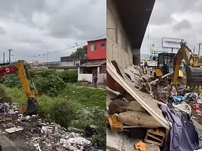Vídeo mostra limpeza e remoção de barracos na lateral do viaduto em São Vicente