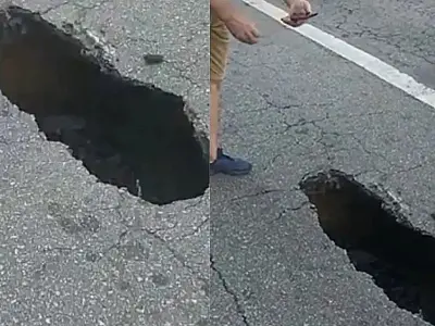 Buraco na Av. Ana Costa causa transtornos no trânsito da região